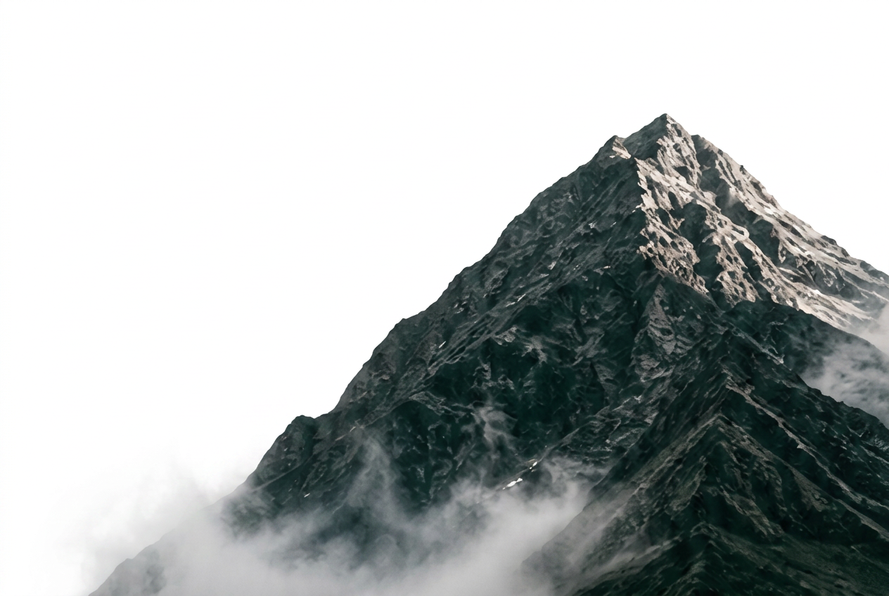 Mountain peak rising above mist behind the Pretium-Delta triangle